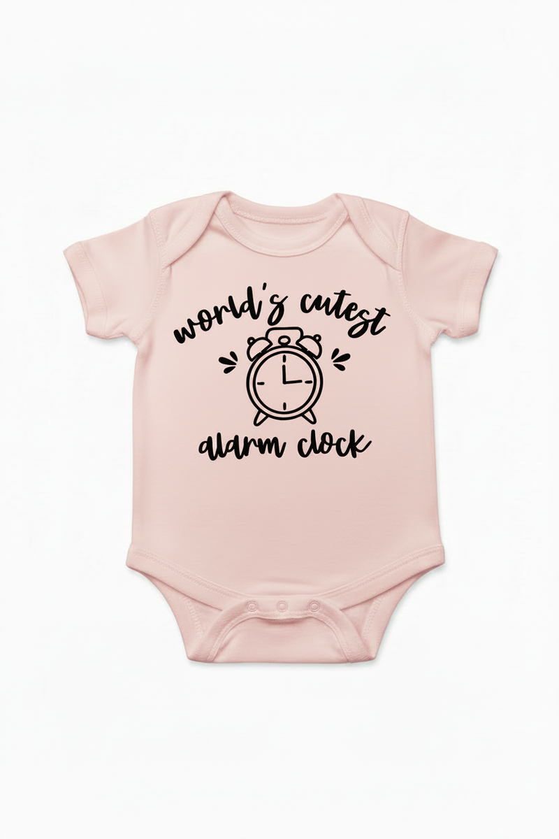 Pink baby onesie with 'world's cutest alarm clock' text and graphic on a white background